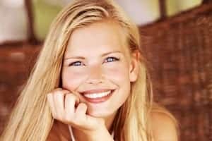 young blonde woman's face smiling