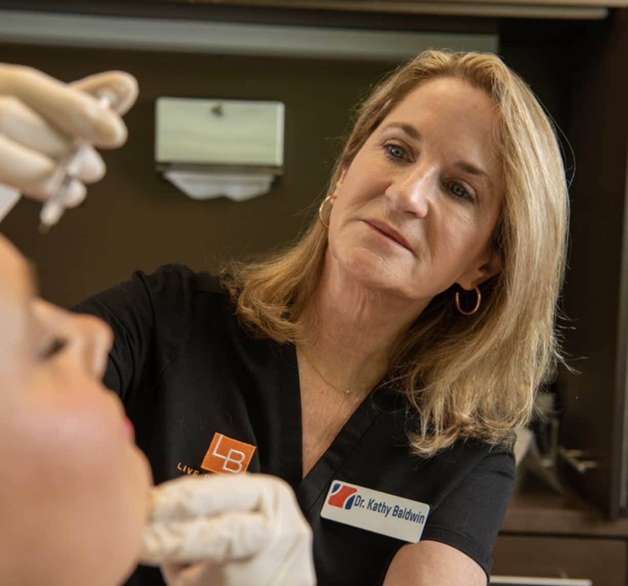 Dr. Baldwin with a patient