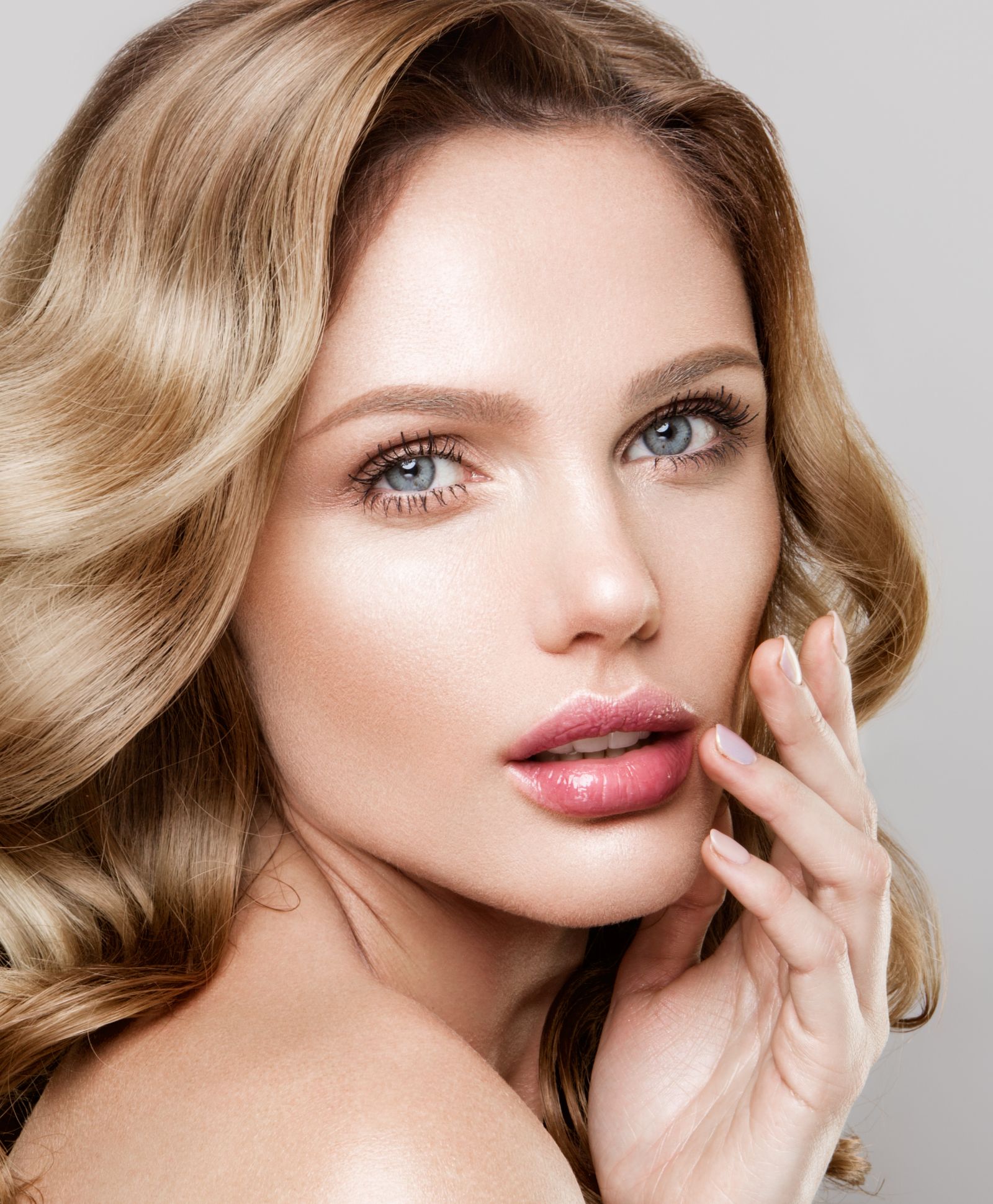 Female face close up with light make up on